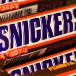 Making a Snickers bar is a complex science - a candy engineer explains how to build the airy nougat and chewy caramel of this Halloween favorite