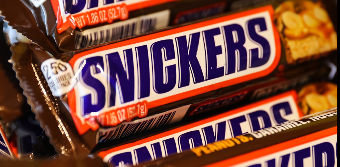 Making a Snickers bar is a complex science - a candy engineer explains how to build the airy nougat and chewy caramel of this Halloween favorite